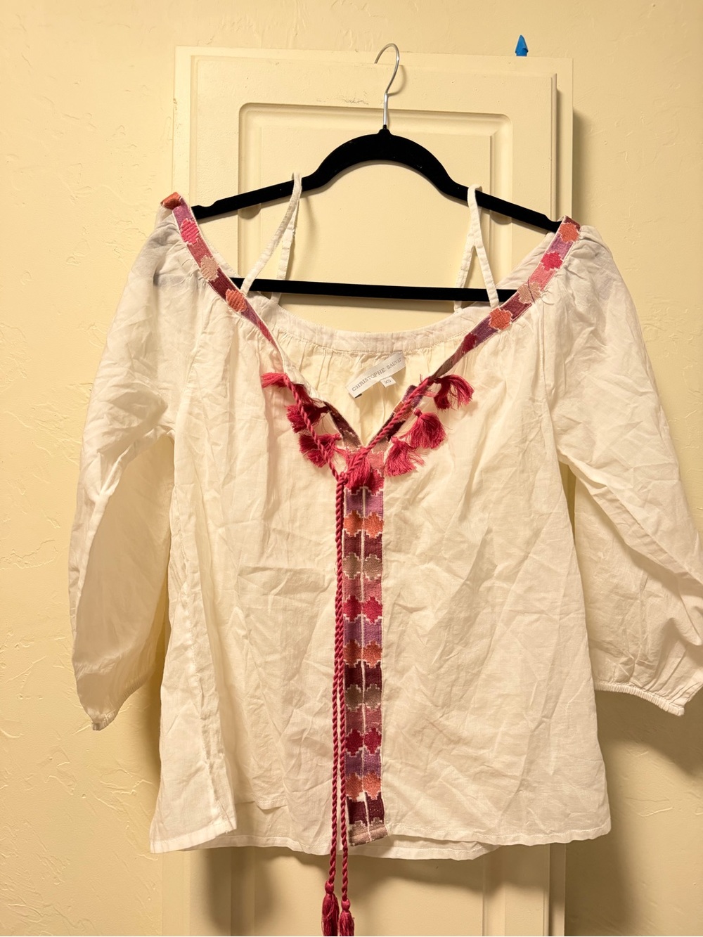 Women's White Off-Shoulder Peasant Blouse with Pink Tassel Trim